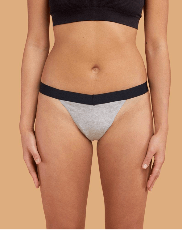 woman wearing a Thinx grey period thong 