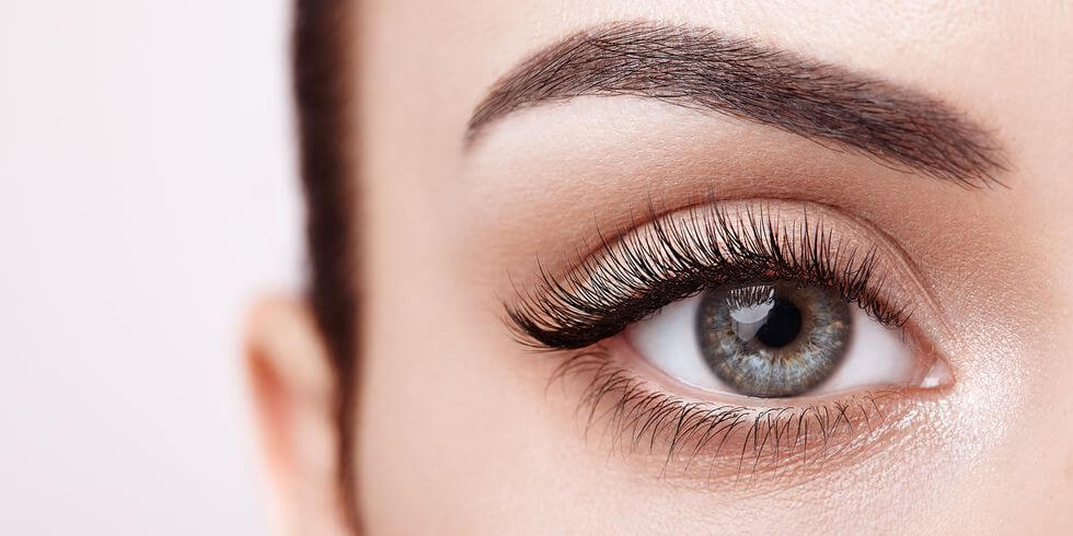 close up of a woman's eye and eyebrow