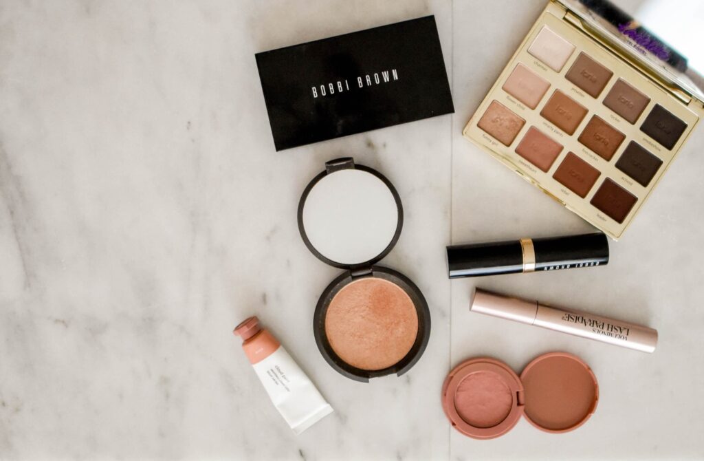 Flat lay of various makeup products