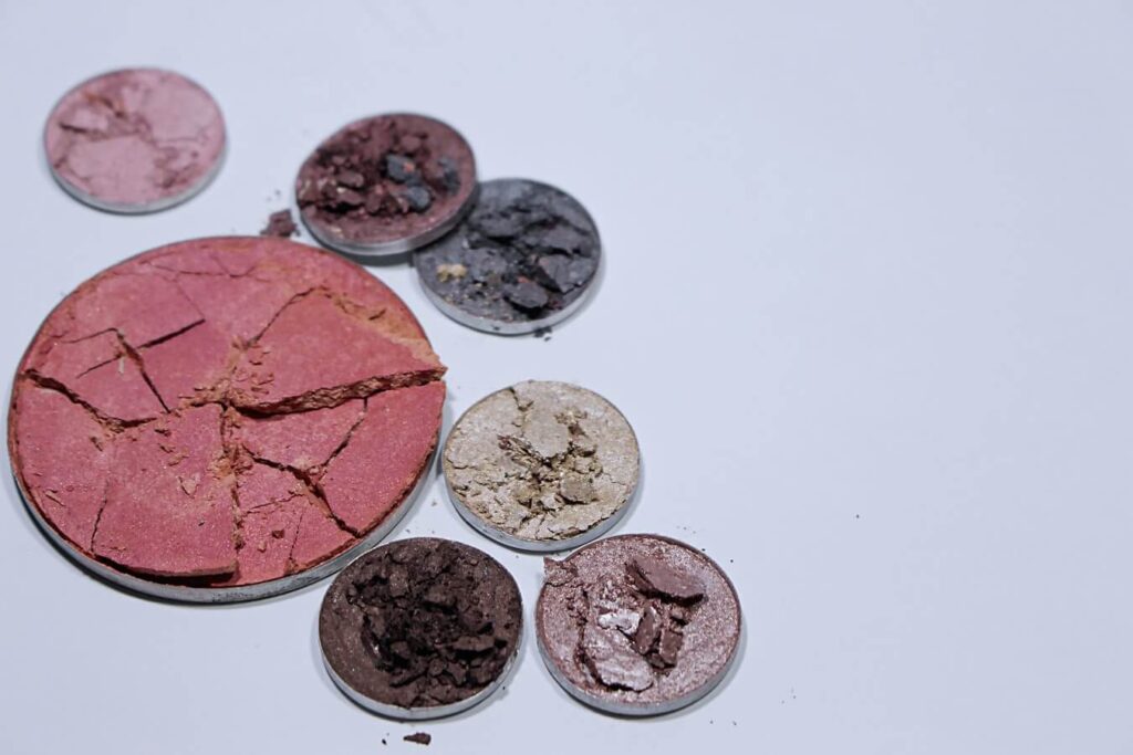 set of crushed eyeshadows and blusher fake makeup