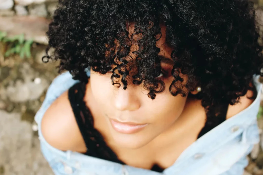 shot of woman's black curly hair